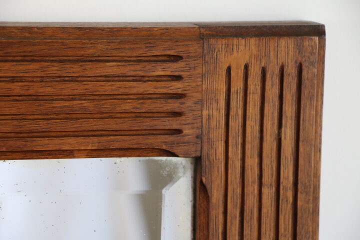 Beveled mirror grooved wood