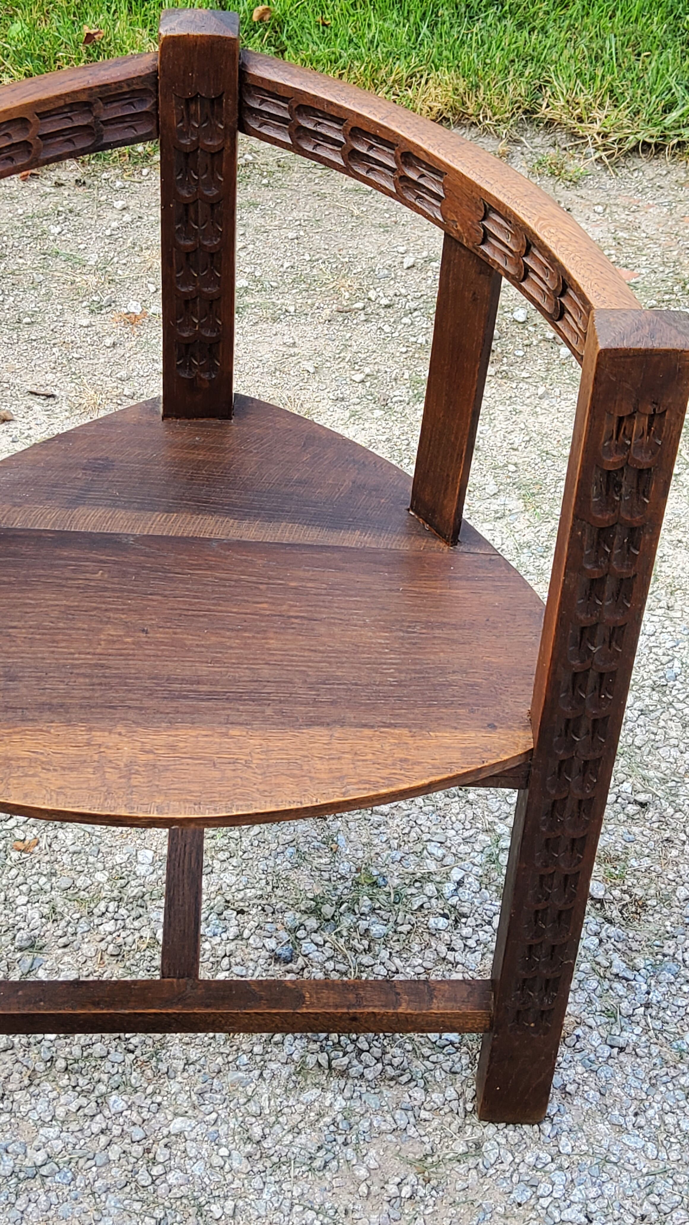 Set of three brutalist tripod armchairs in carved solid oak