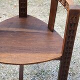 Set of three brutalist tripod armchairs in carved solid oak
