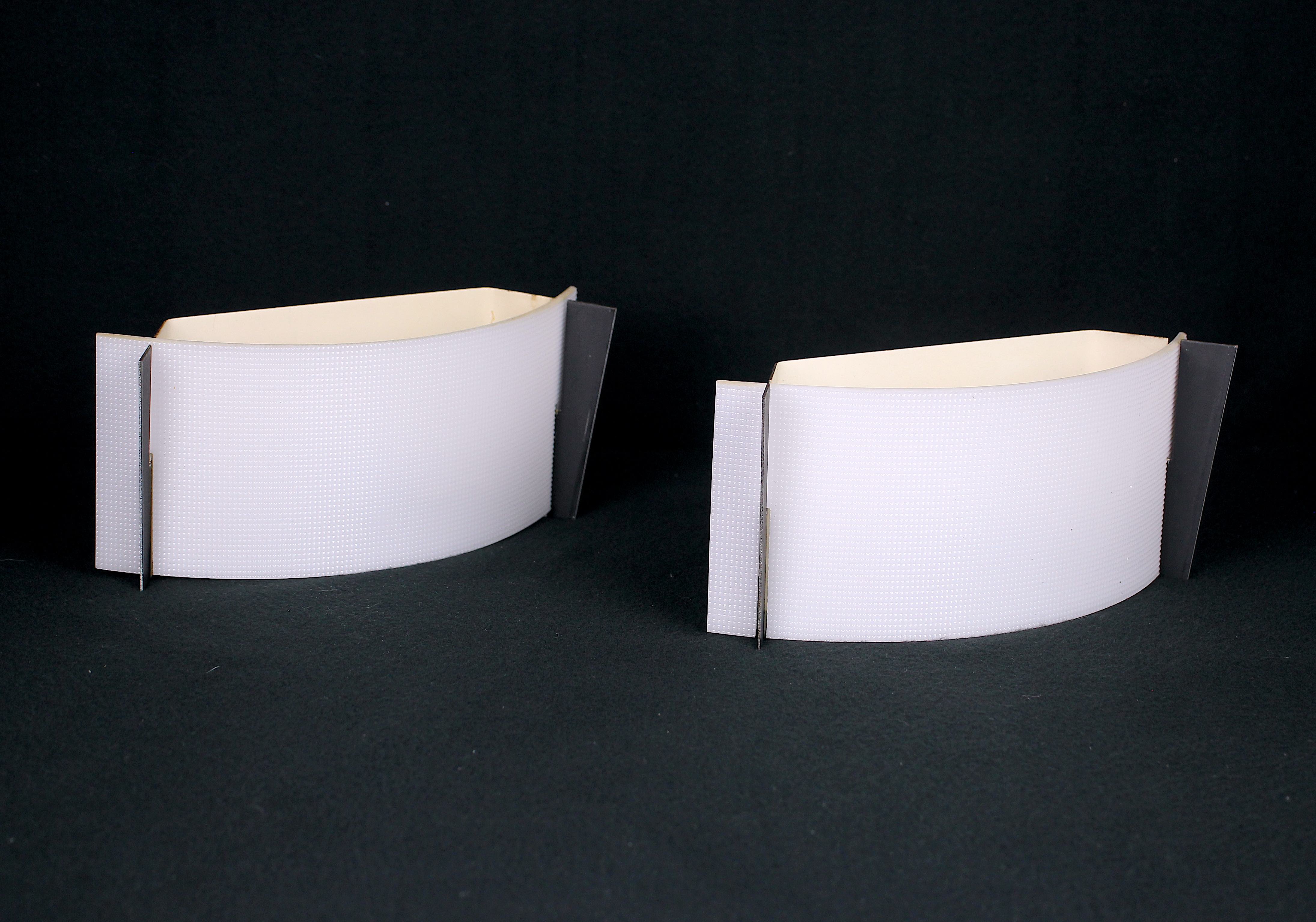 Pair of mid-century wall lamps in black metal and perspex, france