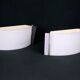 Pair of mid-century wall lamps in black metal and perspex, france