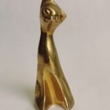 Trio of cats in gilded brass