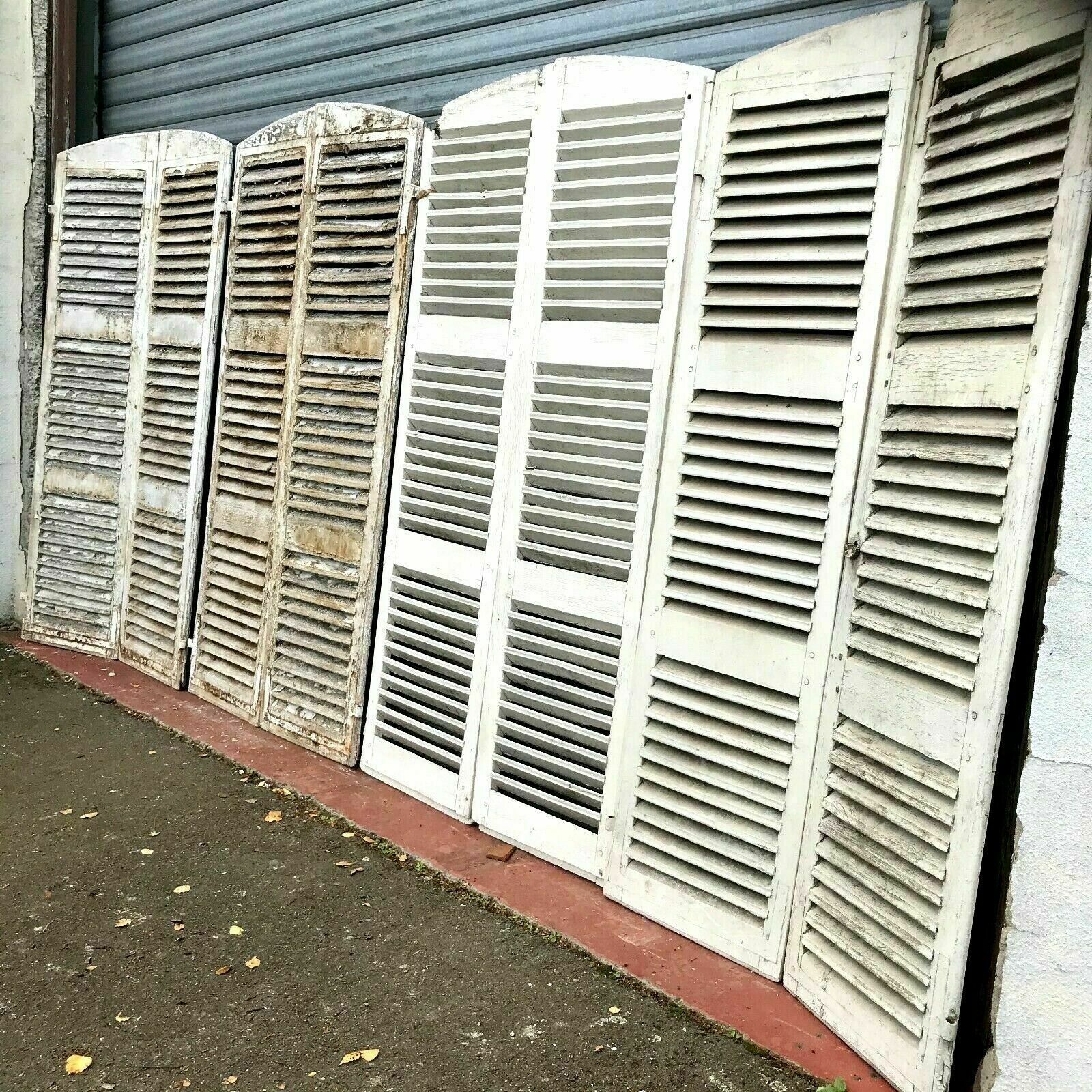 Suite of four pairs of shutters in massive 19th century channel