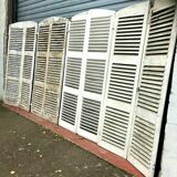 Suite of four pairs of shutters in massive 19th century channel