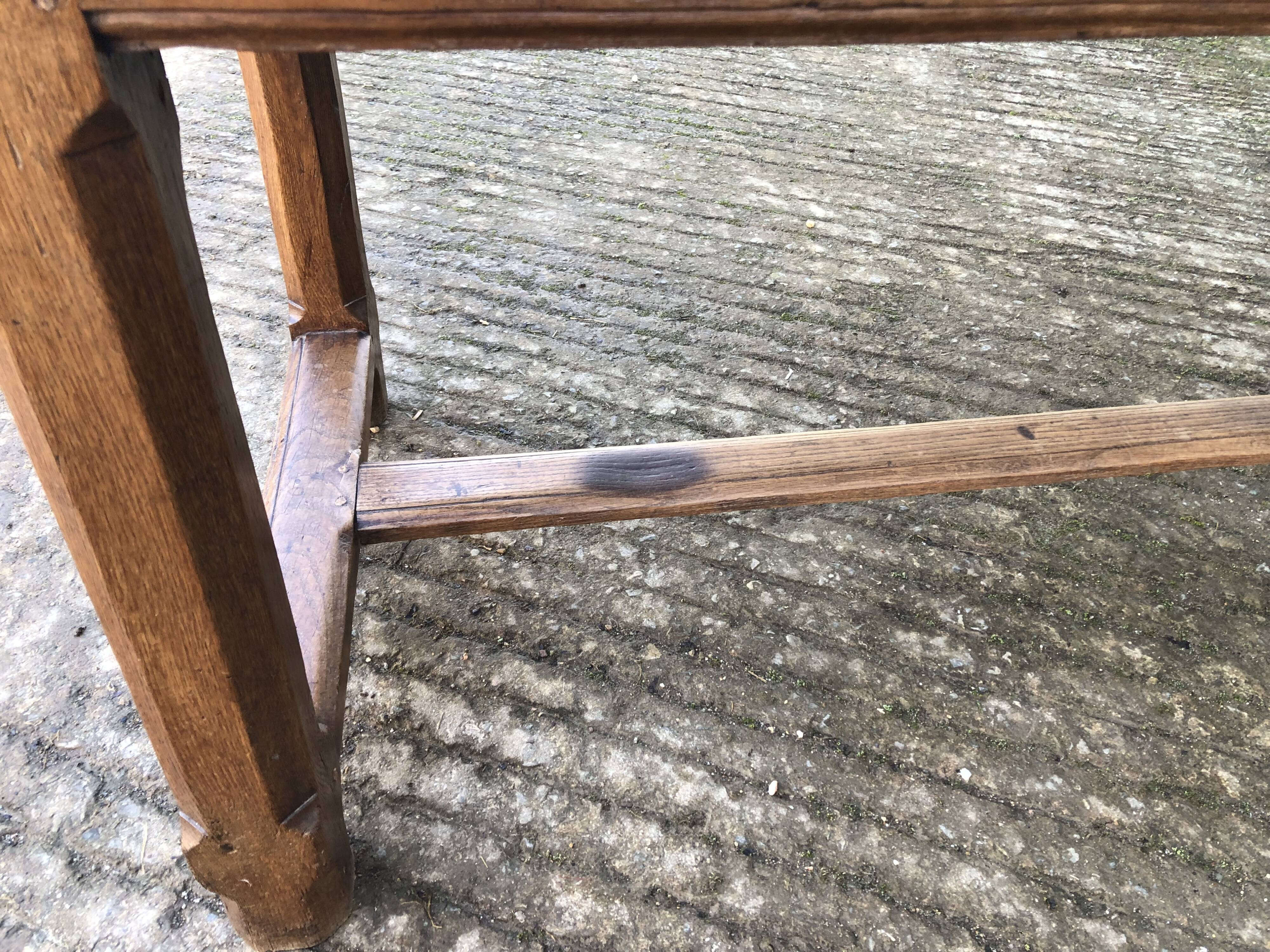 Antique oak farmhouse table with cat bar and 2 end drawers