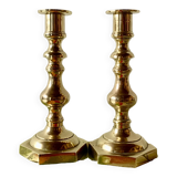 Pair of old brass candlesticks