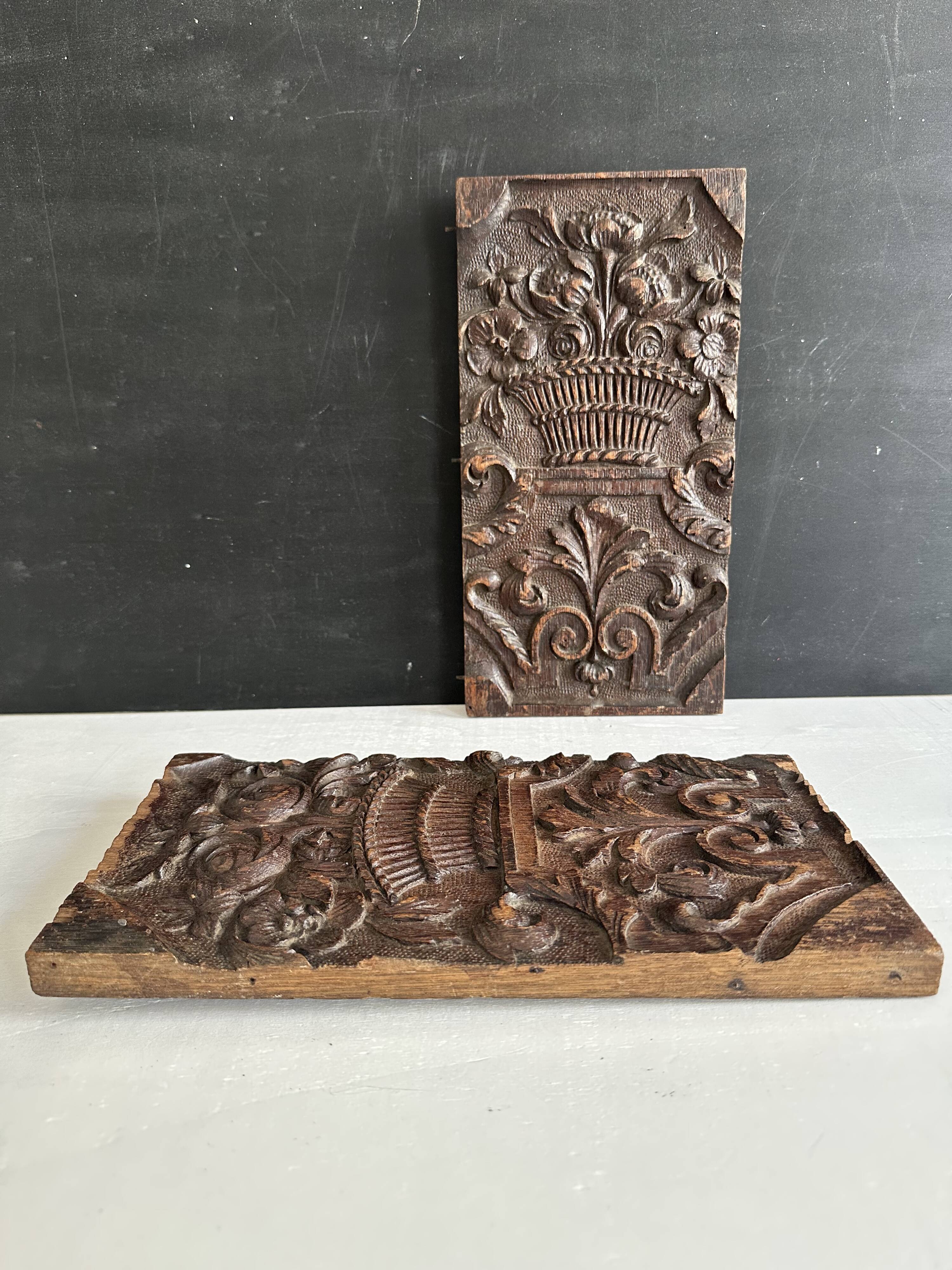 Pair of antique decorative panels in carved wood, 19th century