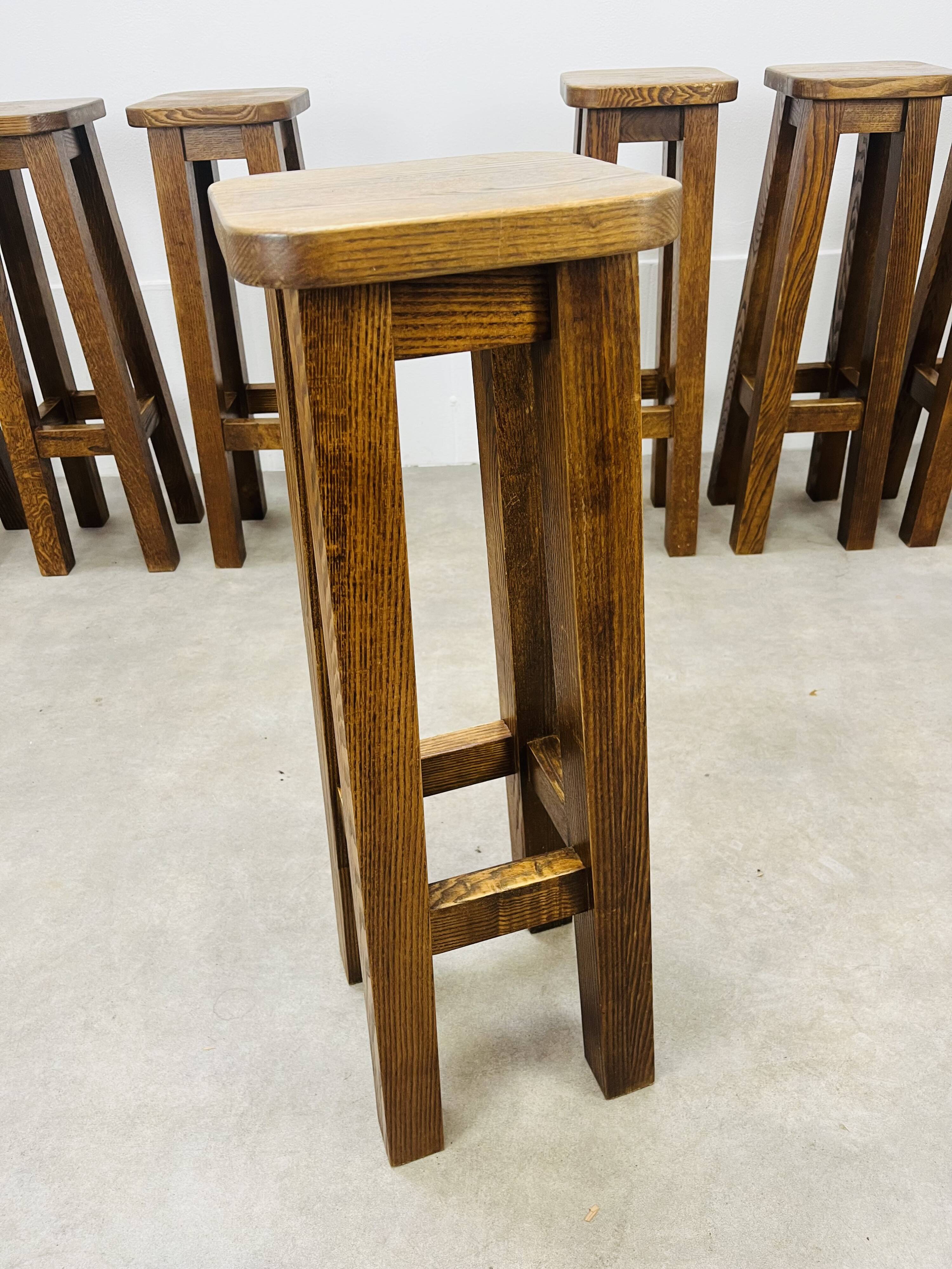 8 solid wood bar stools in brutalist style