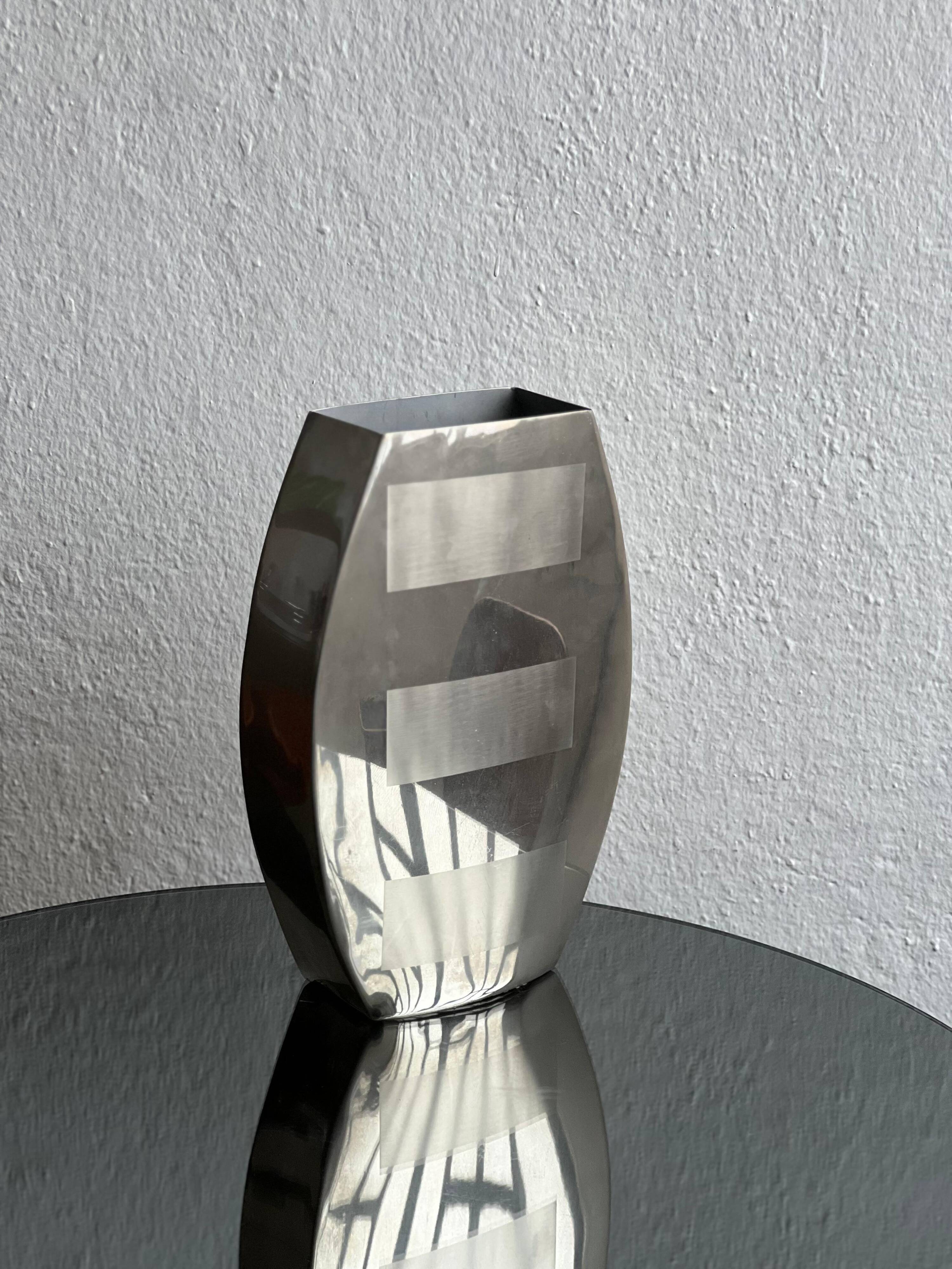 Decorative stainless steel vase with geometrical shapes imprinted, 1970's