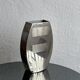 Decorative stainless steel vase with geometrical shapes imprinted, 1970's