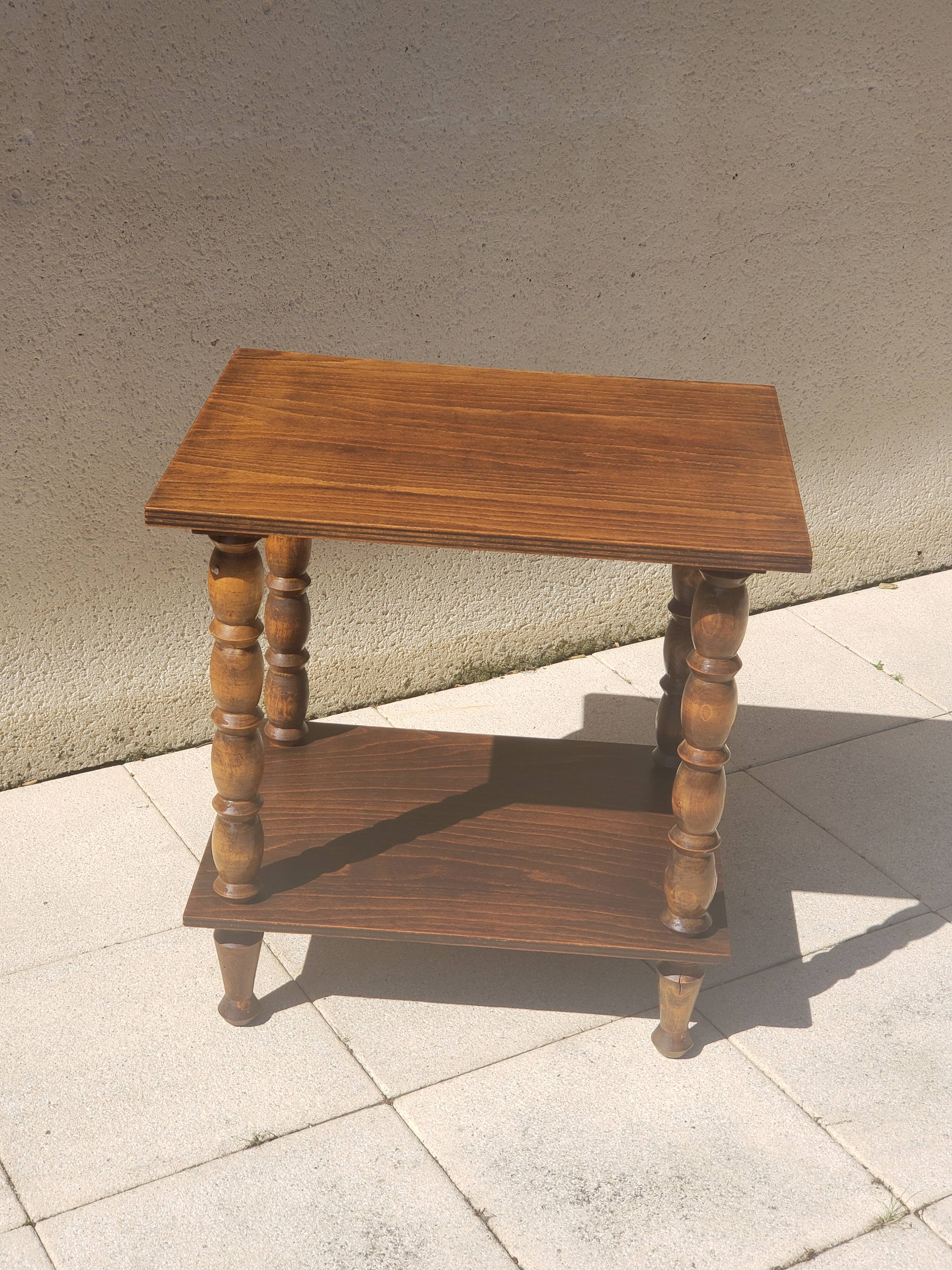 Vintage wooden console side table with turned legs.
