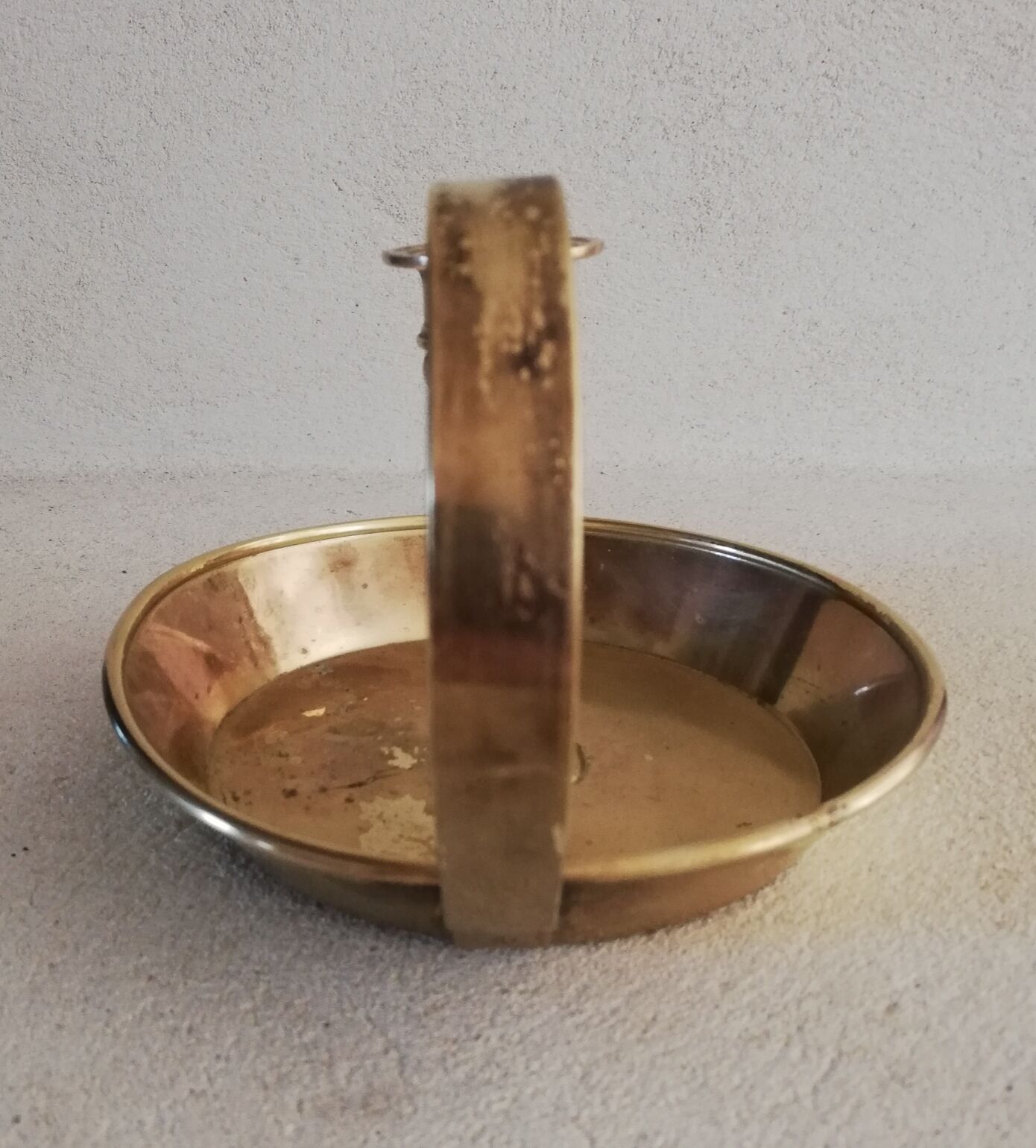 Brass hand candle holder