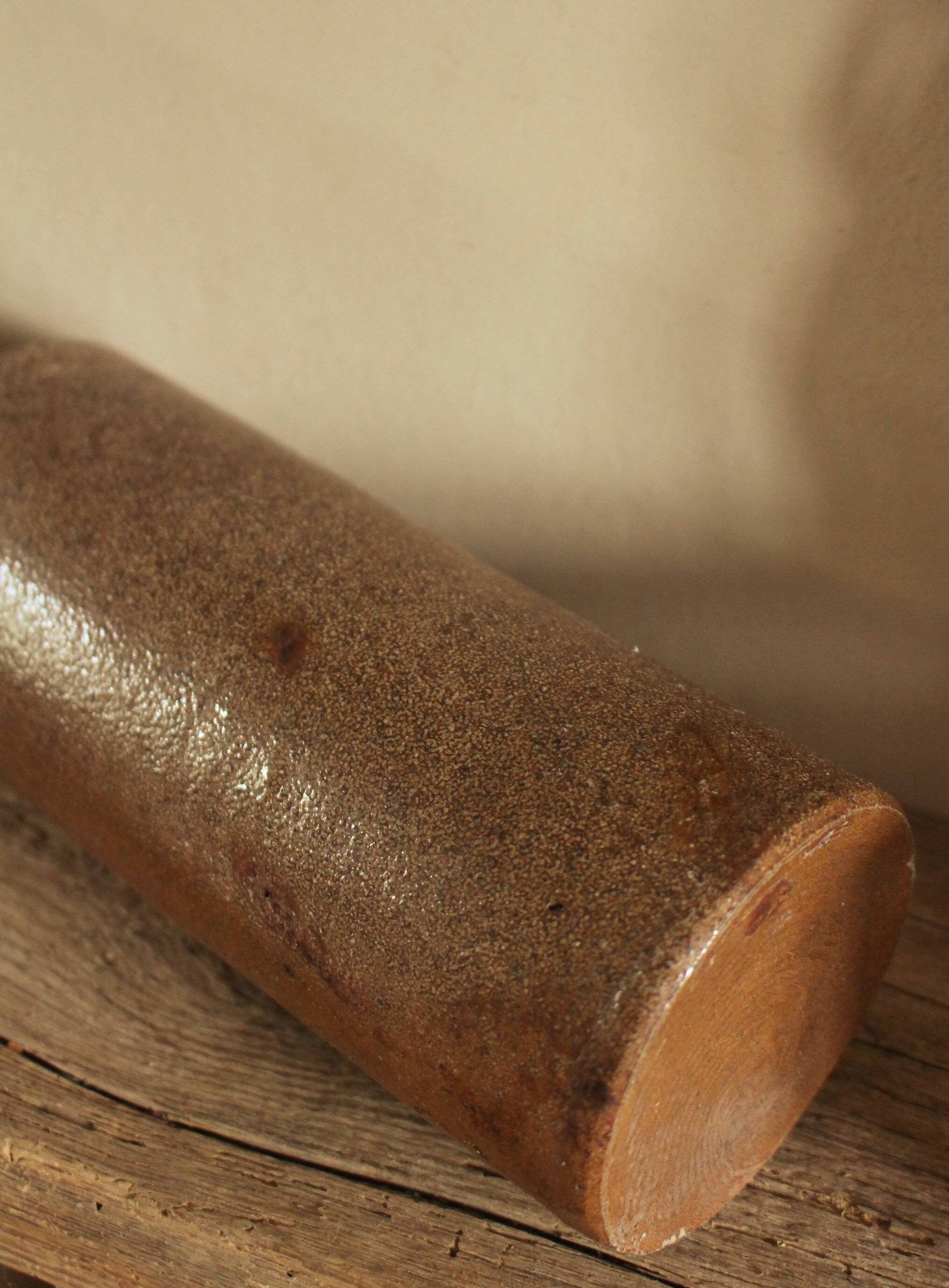 Vintage stoneware liqueur bottle with pouring spout