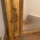 Nineteenth century mirror in wood and stucco gilded with rich gold leaf ornamentation, 101x127 cm