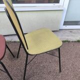 Set of 3 vintage yellow and red faux leather chairs.