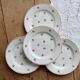 4 vintage dessert plates ceramic red patterns