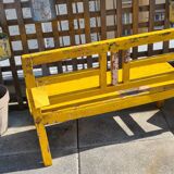 Old yellow teak school bench