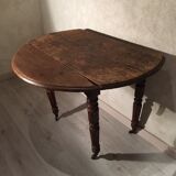 Round table old solid oak wheels 2 extensions folding sides