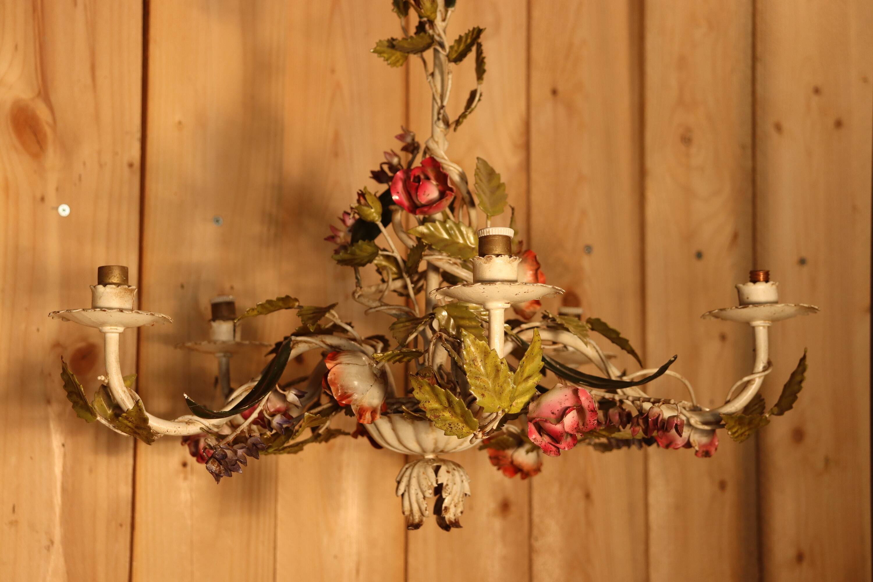 Antique iron chandelier with Art Nouveau floral decoration