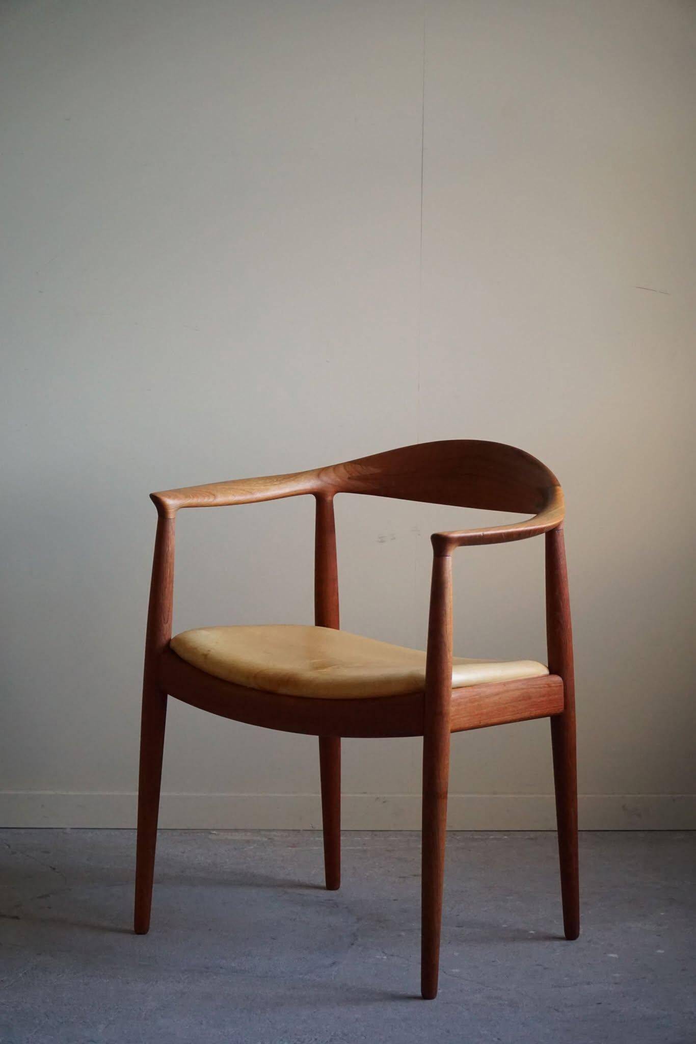 Hans J. Wegner, Teak and leather armchair, model "The Chair" JH501, 1950s