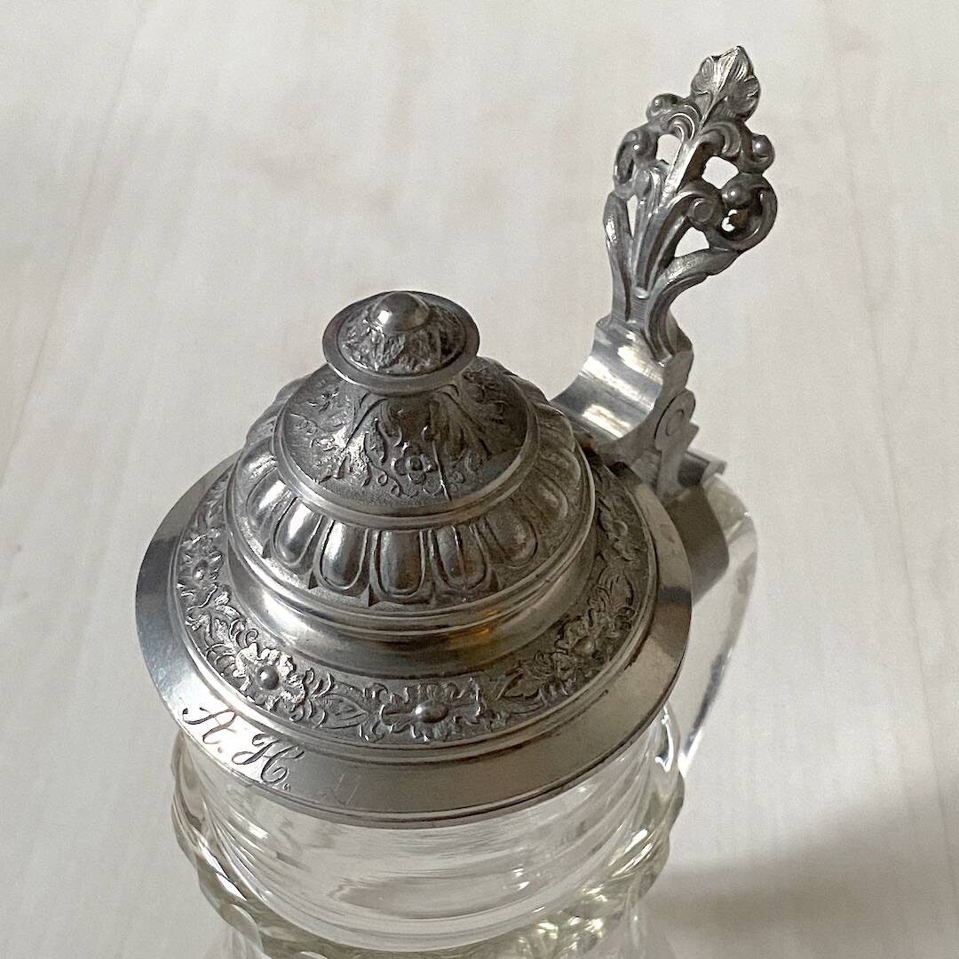 Bohemian crystal beer mug with chiseled pewter lid