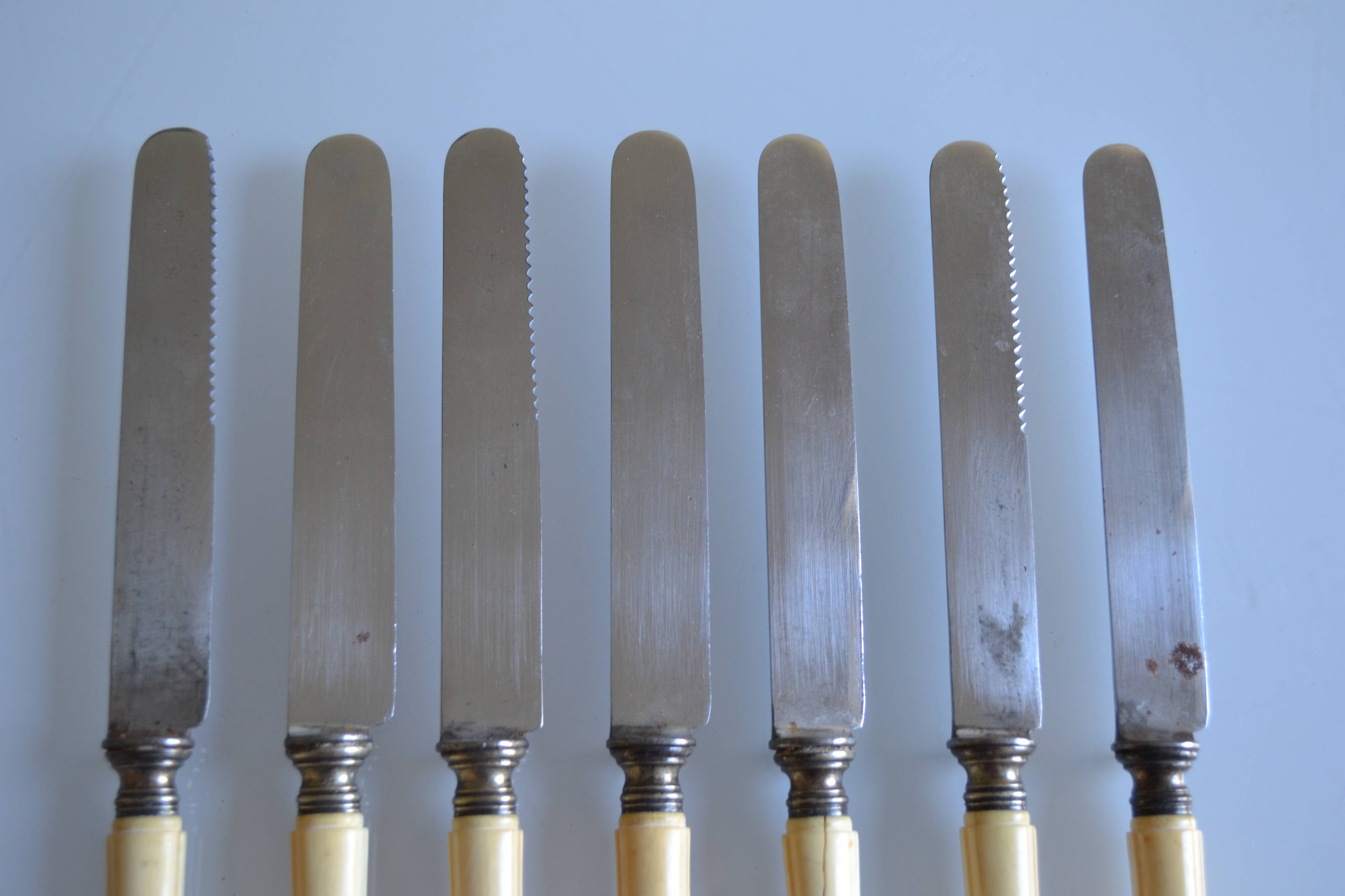 7 old table knives from the 19th century, monogrammed ivory-colored handles