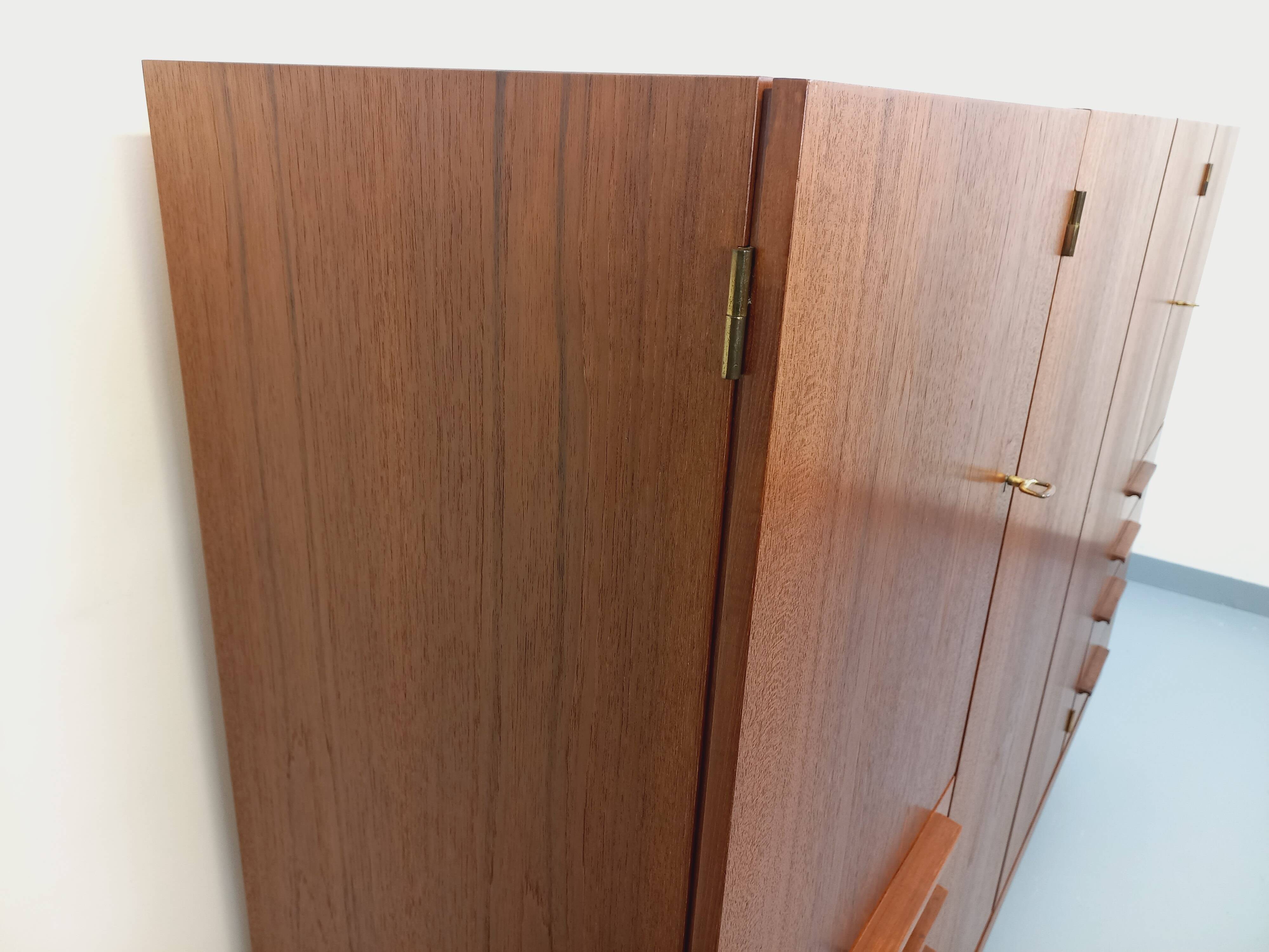 High Scandinavian modernist vintage sideboard in teak and black metal.