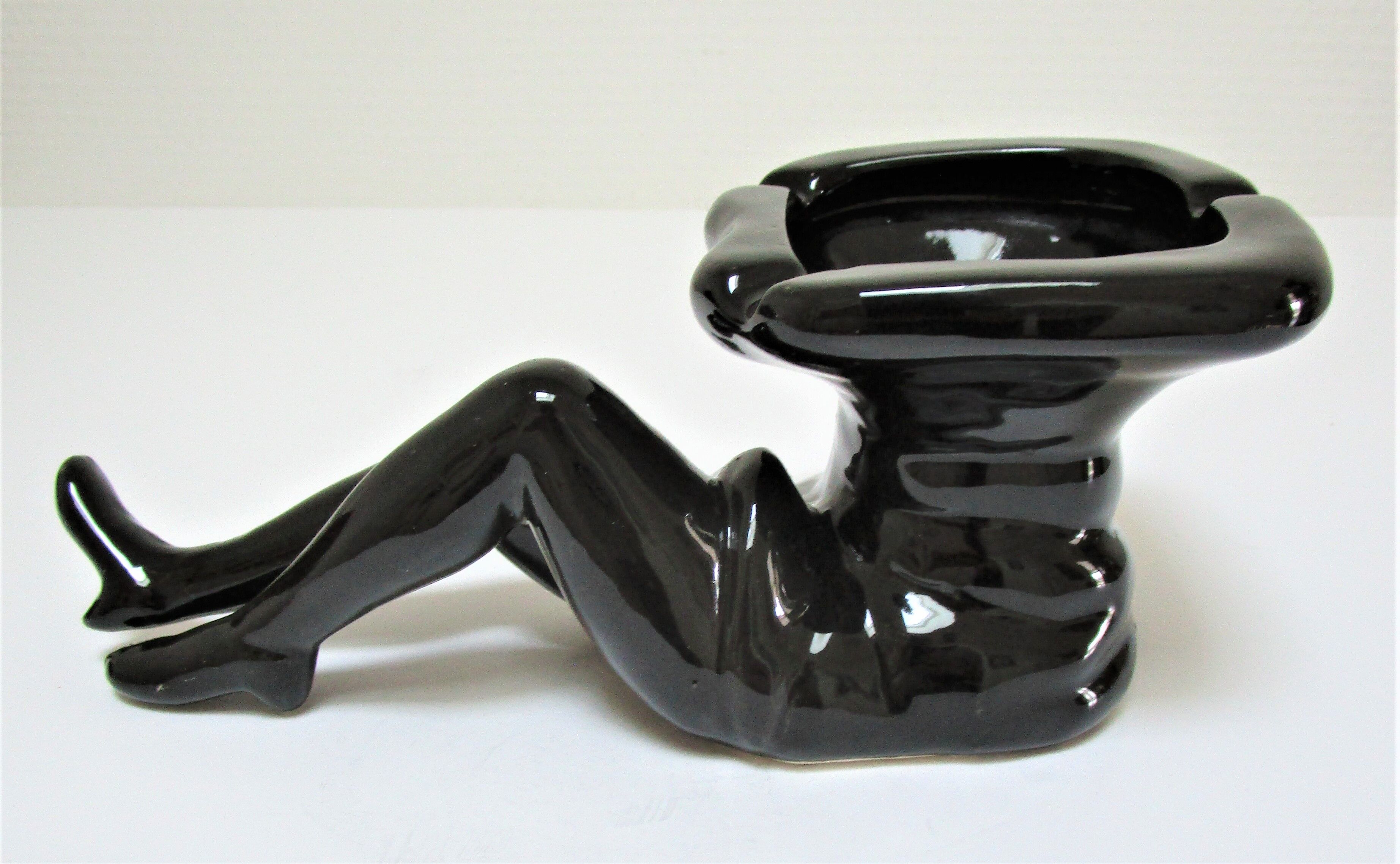 Anthropomorphic ashtray legs ceramic black design 80s