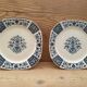Pair of plates on presentation legs, terre de Fer Gien
