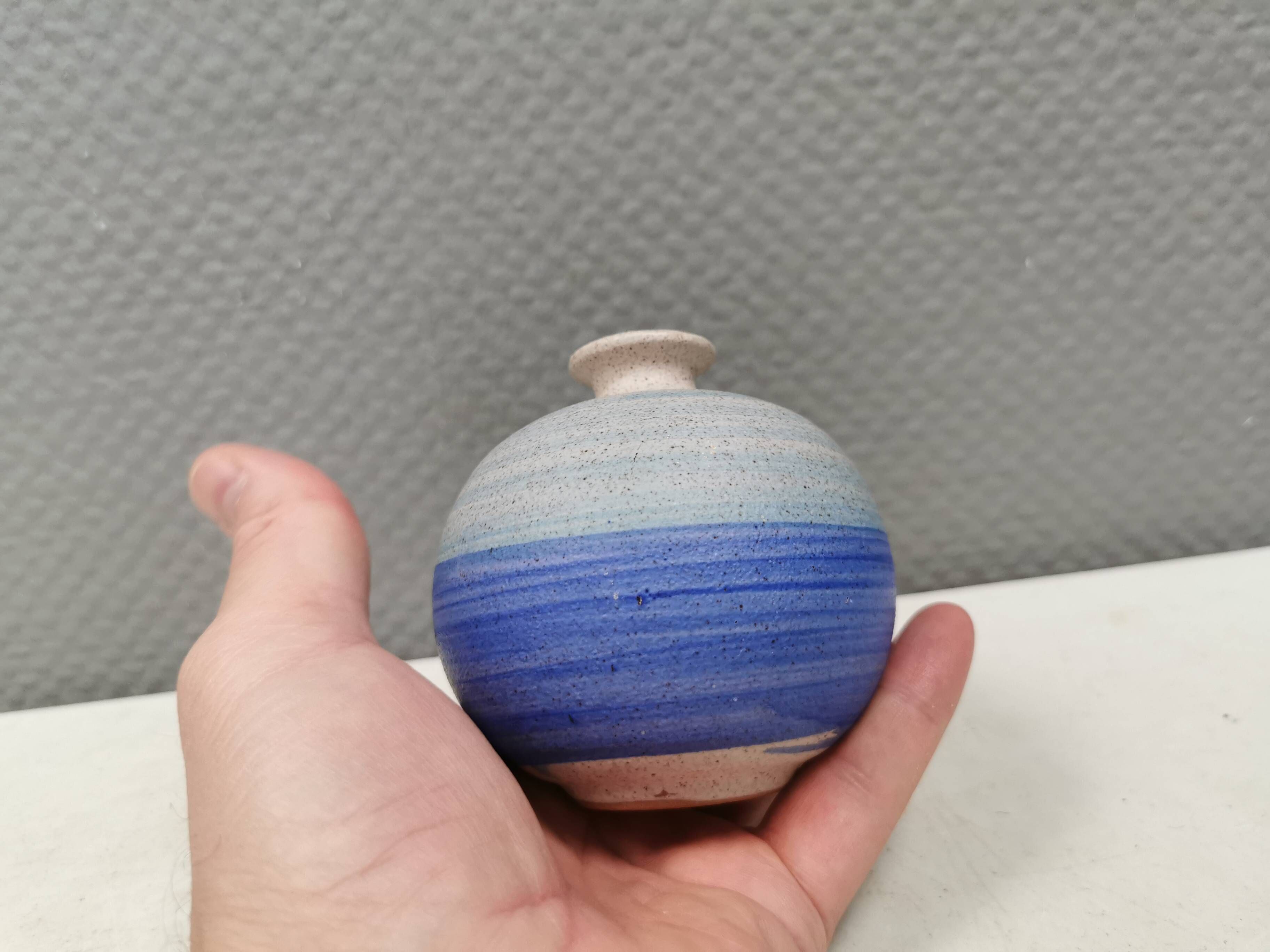 A small, round, beautiful ceramic vase from Denmark, dating from the 1980s.