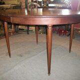Oval mahogany table with extension cords