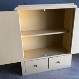 Weathered toilet cabinet