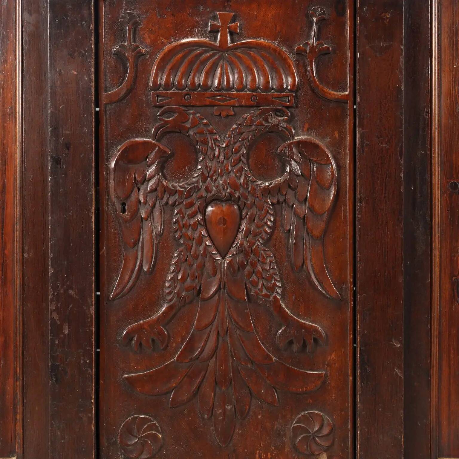 Antique walnut and fir wardrobe with drawers, Italy, 18th century.