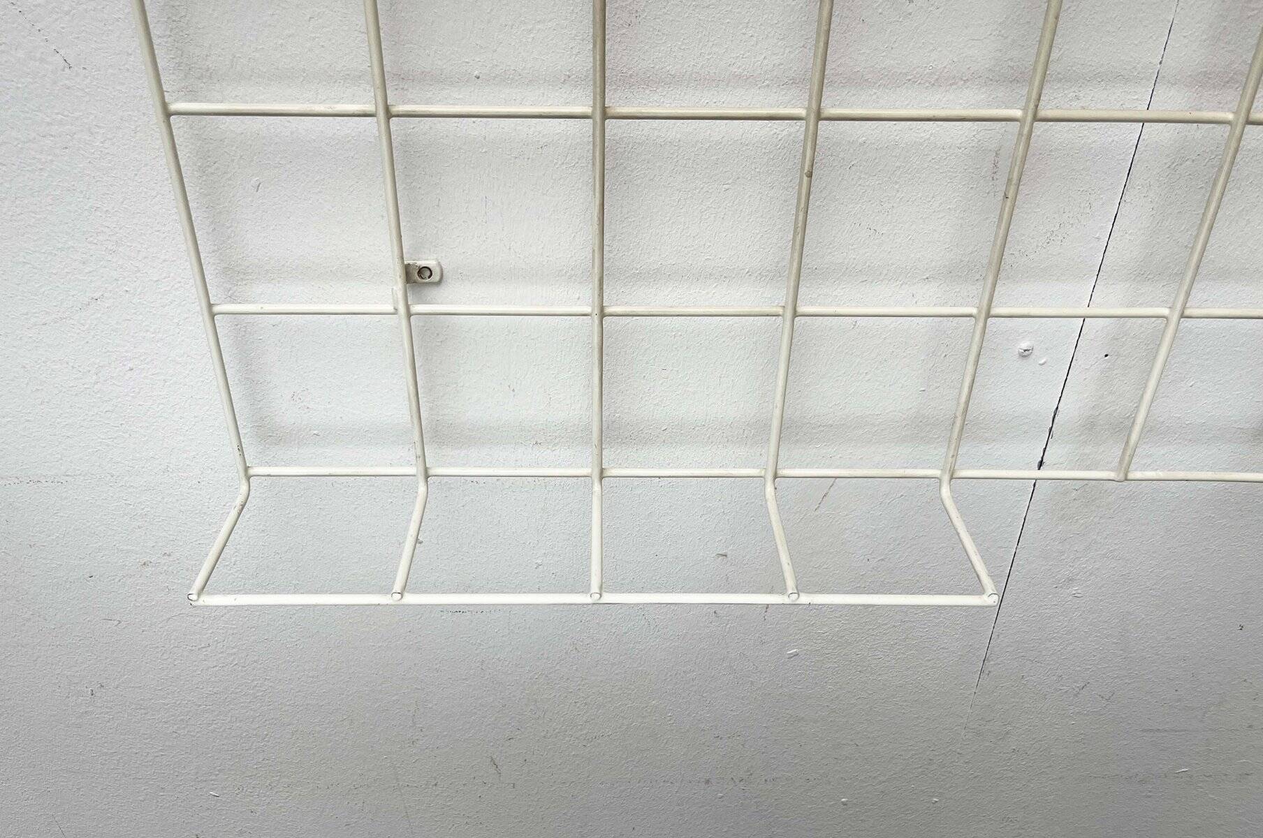 Minimalist white wire coat rack from mid-century Germany, 1960s.