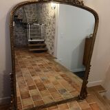 Large gilded mirror with pediment
