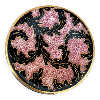 Ceramic plate with relief decorations from the 1960s.