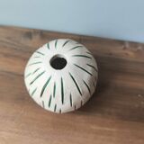 Small round ceramic ball vase with dried flower