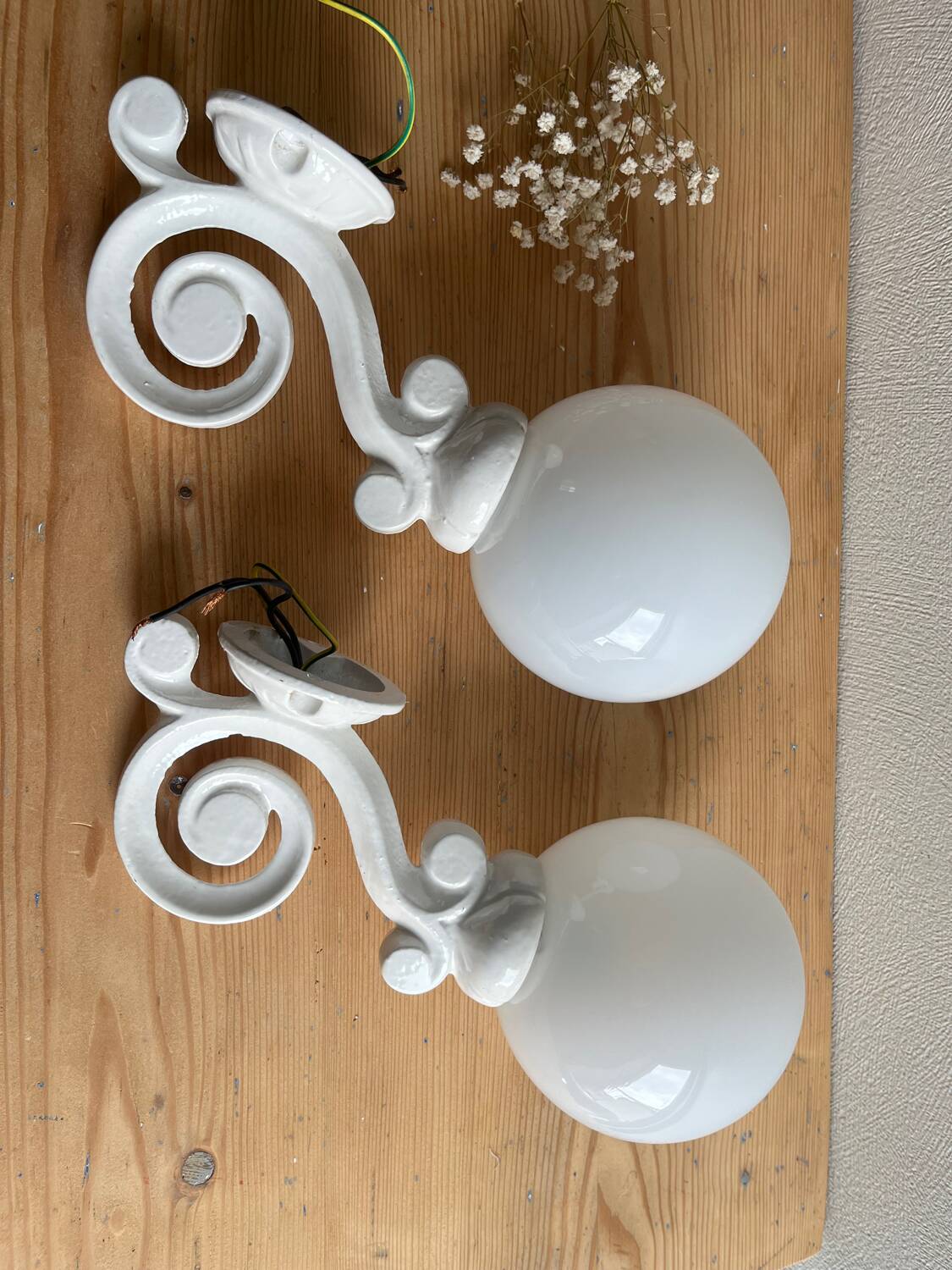 Antique enamelled cast iron wall lights / opaline globe