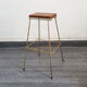 Small harness, brass plant holder and wood