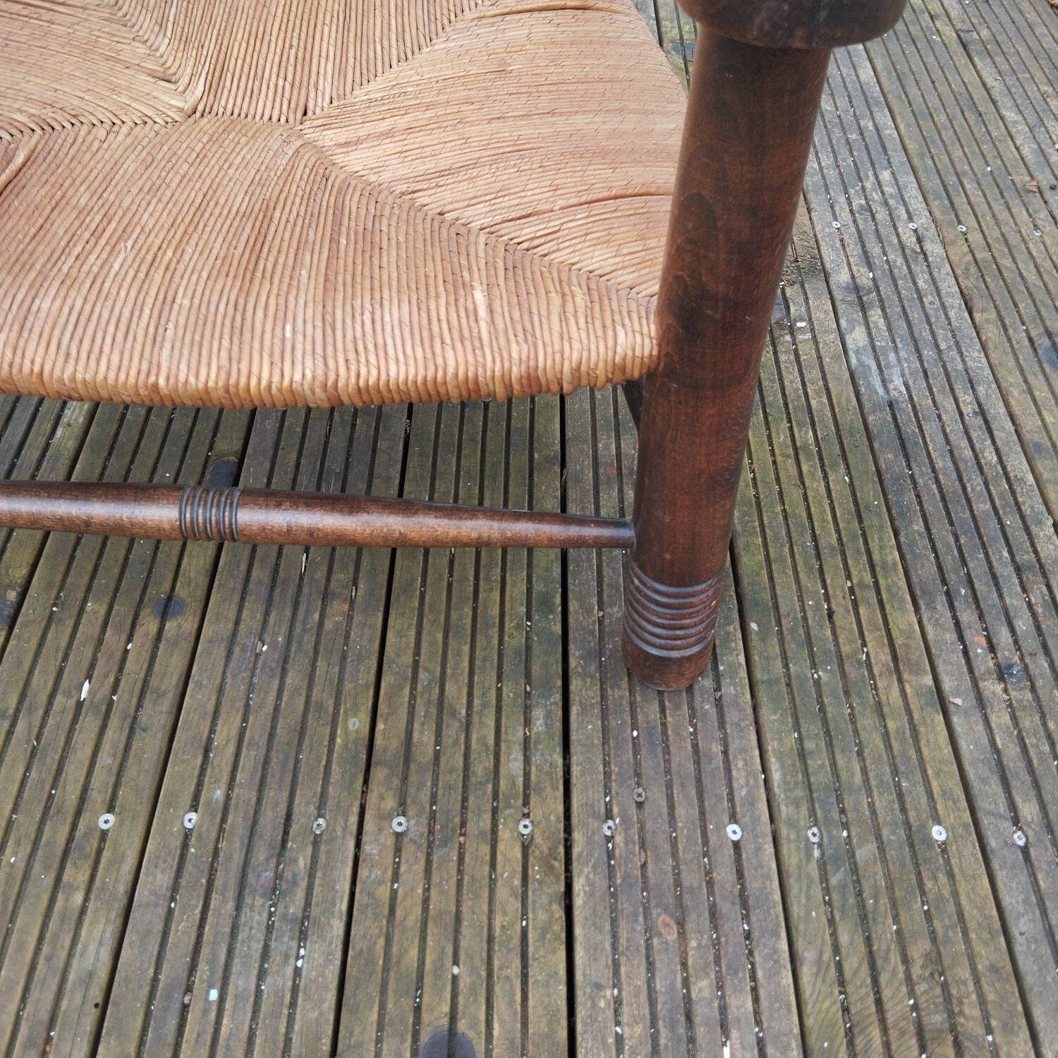 Low straw fireplace armchair in Dudouyt style