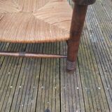 Low straw fireplace armchair in Dudouyt style