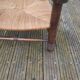 Low straw fireplace armchair in Dudouyt style