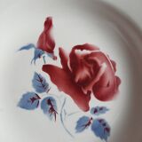 Mismatched old soup plates accompanied by a soup tureen