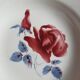 Mismatched old soup plates accompanied by a soup tureen