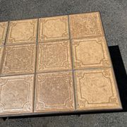 Vintage garden table with ceramic tile top and wrought iron base