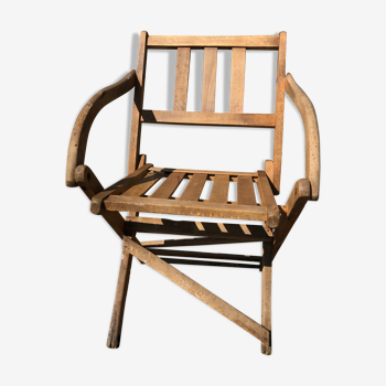 Old folding armchair wooden sitting vintage