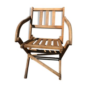 Old folding armchair wooden sitting vintage