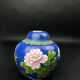 Chinese cloisonné vase decorated with peonies on a blue background, height 15 cm