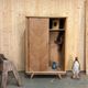 Old vintage sliding wardrobe with compass foot