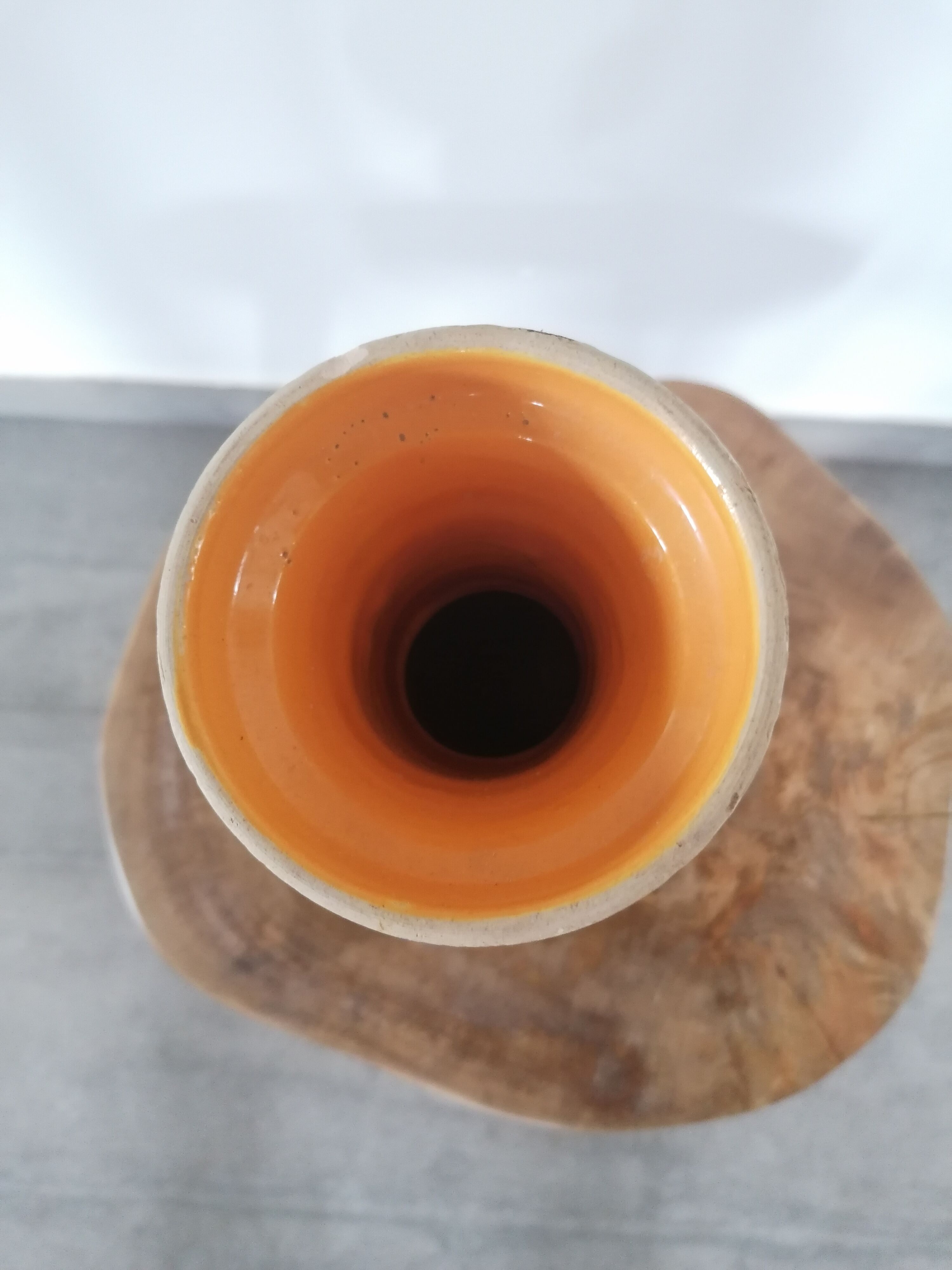 Clear natural terracotta vase decorated ethnic motifs